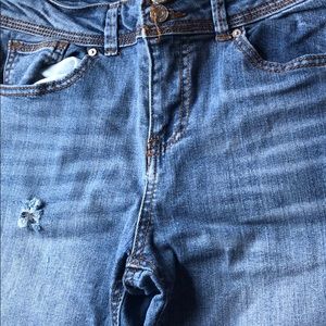 Skinny blue jeans with fashion holes